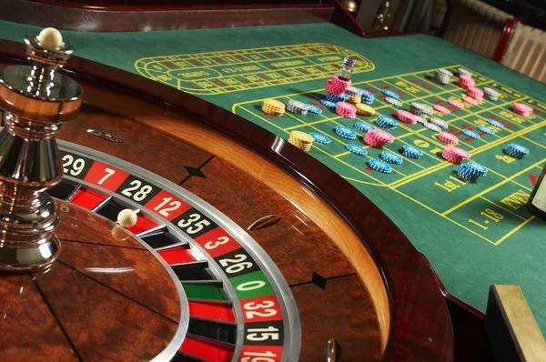 login wongtoto app running on Android and iOS devices showing live-dealer table interface
